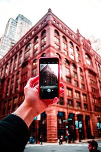 taking a picture of a building on a mobile phone 