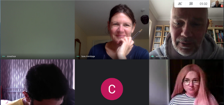 A screenshot of two people looking at the camera Description automatically generated