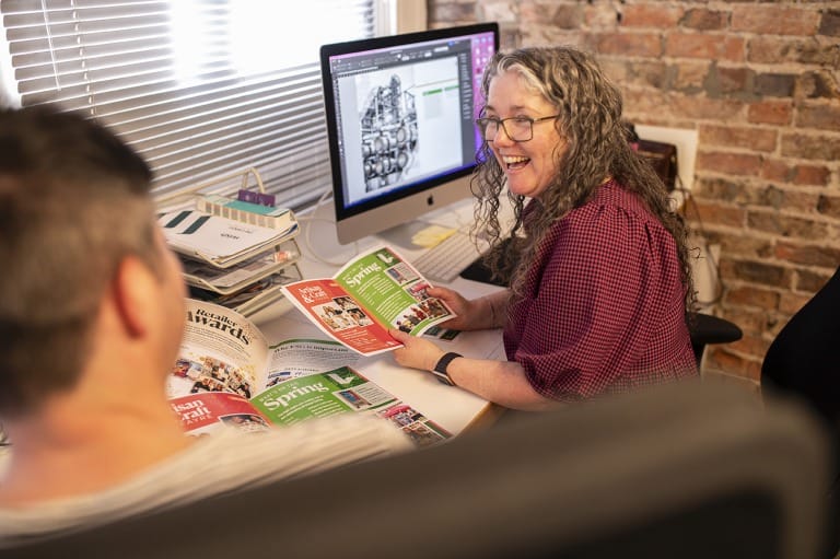 Creatives laughing in studio